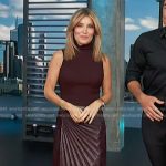 Kit’s burgundy leather skirt on Access Hollywood