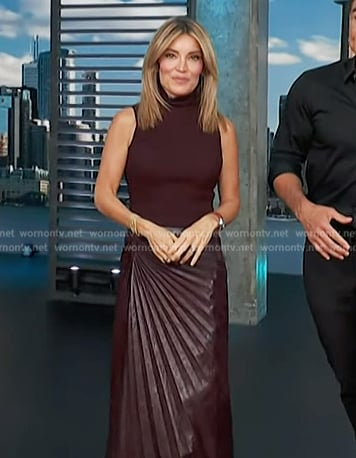 Kit's burgundy leather skirt on Access Hollywood