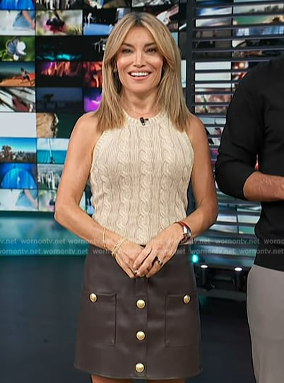 Kit's cable knit vest and leather mini skirt on Access Hollywood