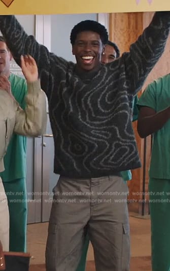 Lando's black swirl print sweater on All American Homecoming