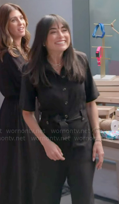 Lisa's black short sleeved jumpsuti on Celebrations with Lacey Chabert