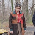 Mabel’s suede colorblock coat on Only Murders in the Building