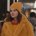 Mabel’s yellow fur jacket and pants on Only Murders in the Building