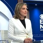 Margaret’s white wrap blazer on CBS Evening News