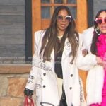 Mary’s white graffiti print coat on The Real Housewives of Salt Lake City