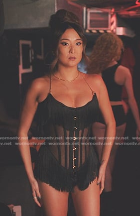 Mindy's black fringed corset top on Emily in Paris