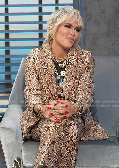 Nadine Crocker's snakeskin print suit on Access Hollywood