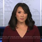 Nancy Chen’s burgundy collared wrap dress on CBS Evening News