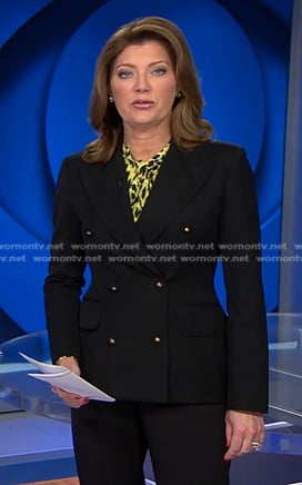 Norah’s yellow leopard blouse and black double breasted blazer on CBS Evening News