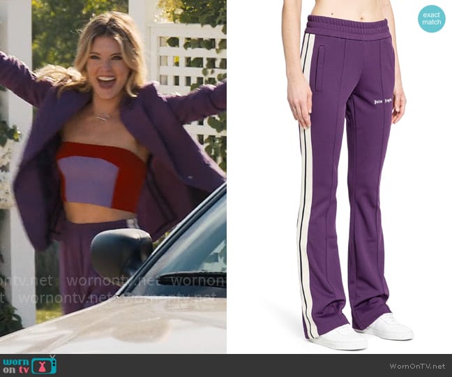 Palm Angels Classic logo flare trackpants worn by Merritt Monaco (Meghann Fahy) on The Perfect Couple