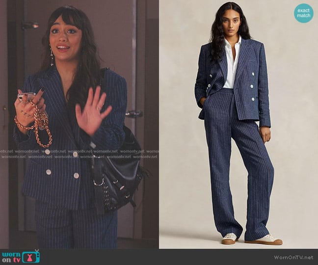 Genevieve’s blue pinstripe pants on Emily in Paris