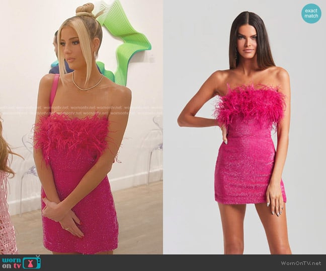 Emma’s pink feather strapless mini dress on Selling Sunset