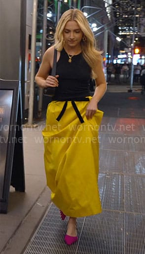 Savannah's black top and yellow maxi skirt on Owning Manhattan