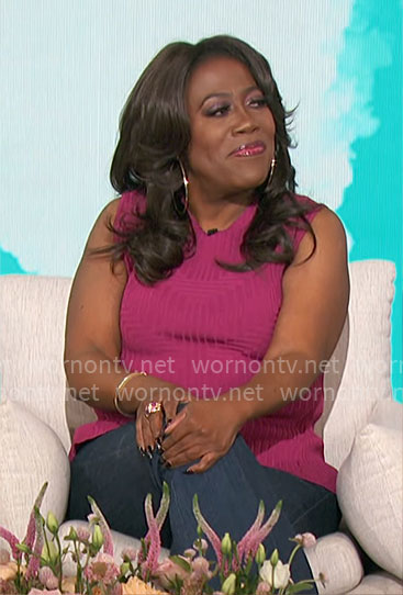 Sheryl’s pink knit peplum top on The Talk