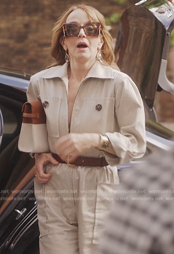 Sylvie's beige utility jumpsuit on Emily in Paris