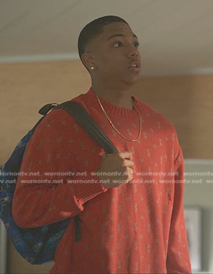 Spenser's red printed knit sweater on Reasonable Doubt