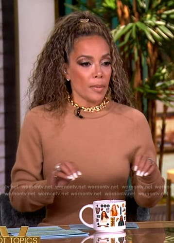 Sunny's beige chain neck sweater dress on The View