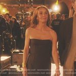 Sylvie’s black strapless dress on Emily in Paris