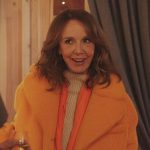 Sylvie’s orange fur coat on Emily in Paris