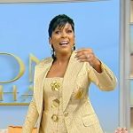 Tamron’s gold metallic dress and blazer on Tamron Hall Show