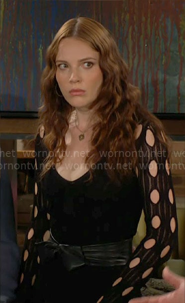 Tessa's black circle cutout knit dress on The Young and the Restless