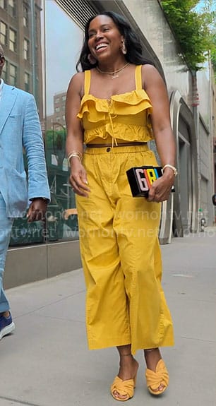 Tricia's yellow ruffled crop top and pants set on Owning Manhattan