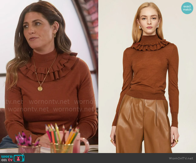 Marisa’s brown ruffle neck sweater on Celebrations with Lacey Chabert