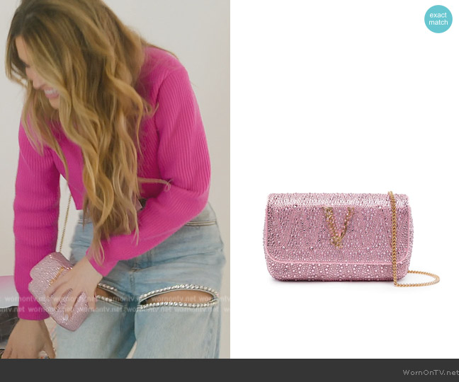 Versace Virtus rhinestone-embellished shoulder bag worn by Chrishell Stause on Selling Sunset