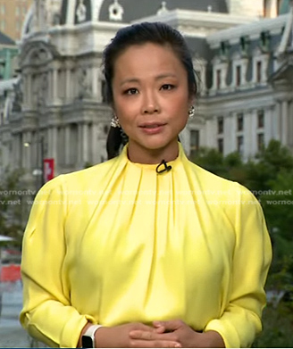 Weijia Jiang’s yellow Pleated blouse on CBS Evening News