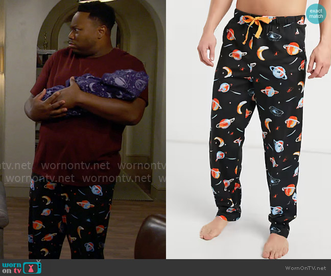 ASOS Design Lounge pajama bottoms in space print worn by Marty (Marcel Spears) on The Neighborhood