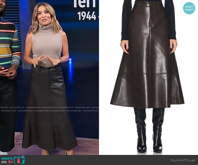 Kit’s brown leather midi skirt on Access Hollywood