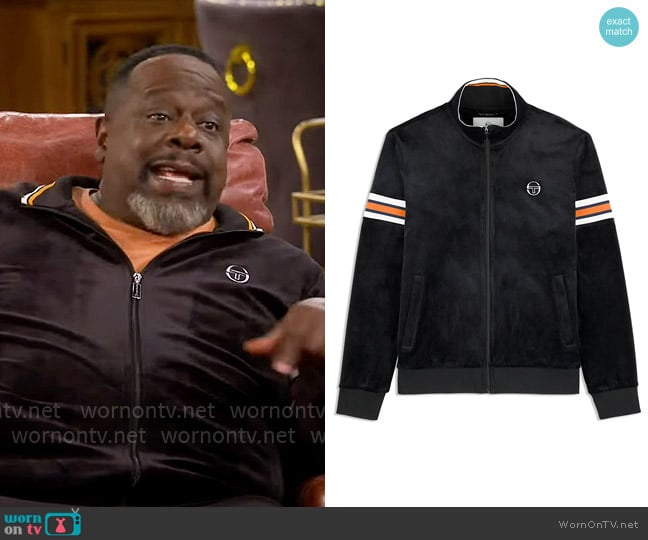 Calvin’s black velour track jacket on The Neighborhood