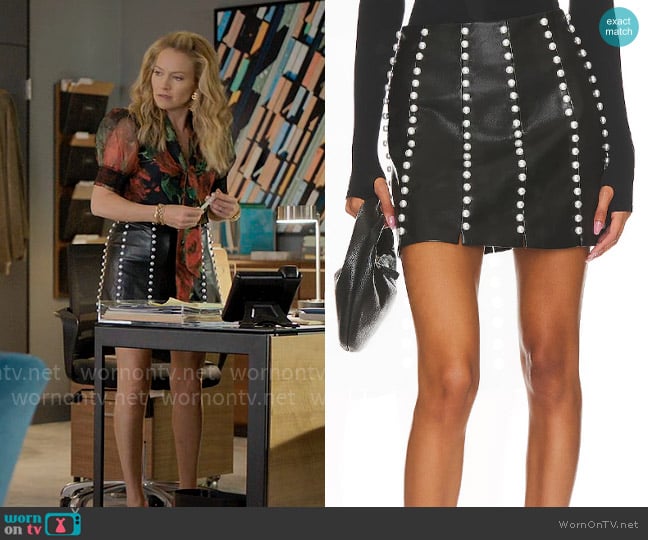 Lorna’s studded leather skirt on The Lincoln Lawyer