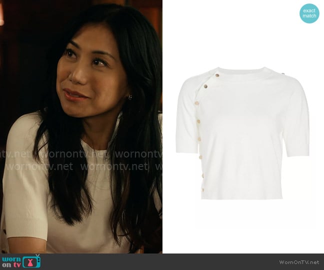 Mel’s white short-sleeve sweater on The Equalizer