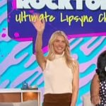 Amanda’s white sleeveless turtleneck and brown mini skirt on The Talk