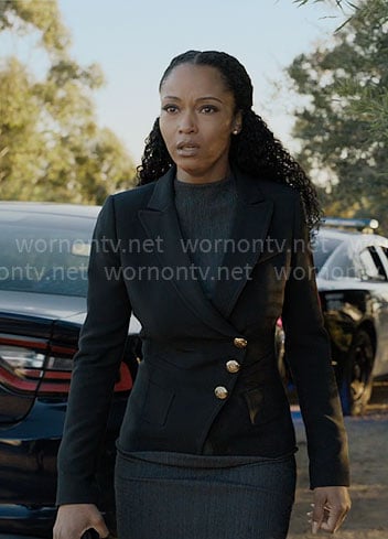 Andrea's black asymmetric jacket with gold buttons on The Lincoln Lawyer