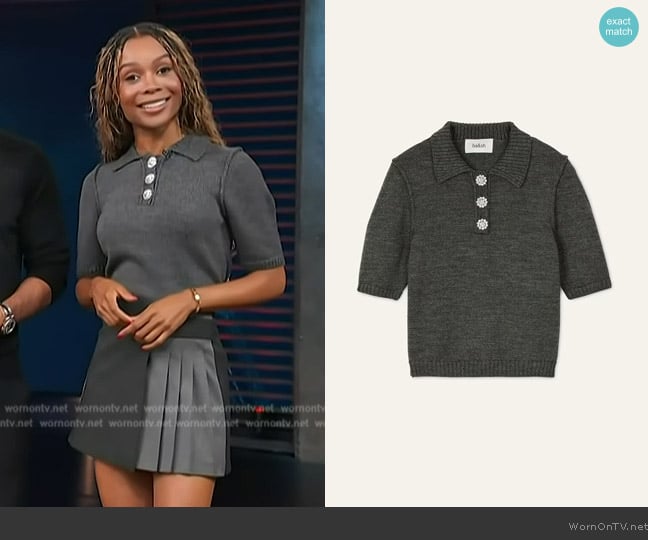 Zuri’s gray polo top on Access Hollywood