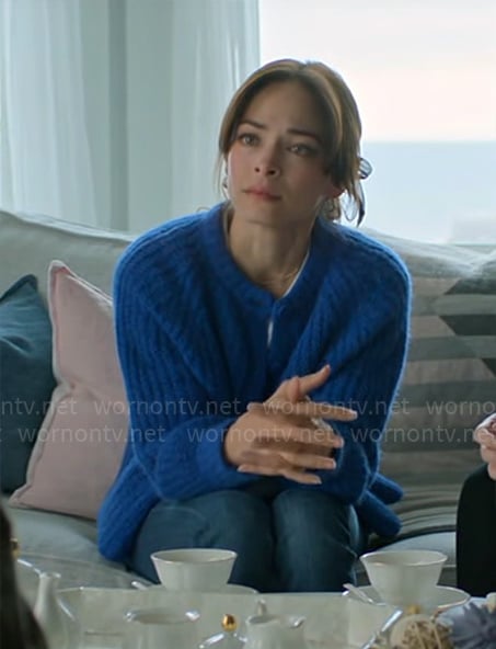 Cassandra's blue cobalt blue cardigan on Murder in a Small Town