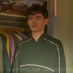 Charlie’s green pullover with white piping on Heartstopper