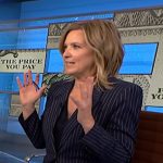 Cristine Romans’ navy pinstripe blazer and skirt suit on NBC News Daily