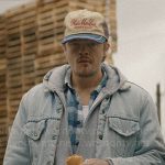 Colin’s denim trucker jacket and Wish Me Luck cap on American Horror Stories