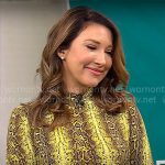 Courtney Cason’s yellow snake print top on CBS Mornings