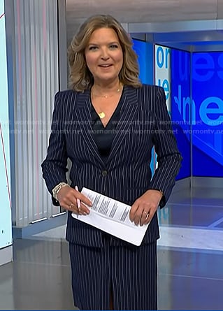 Cristine Romans’ navy pinstripe blazer and skirt suit on NBC News Daily