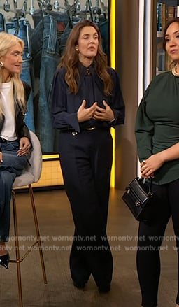 Drew's' black buckle detail pants and pumps on The Drew Barrymore Show