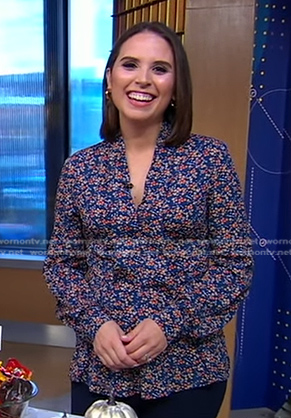 Elizabeth's blue floral v-neck blouse on Good Morning America