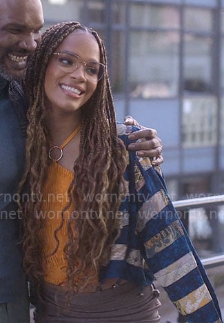 Elle's orange ring halter top and patchwork jacket on Heartstopper