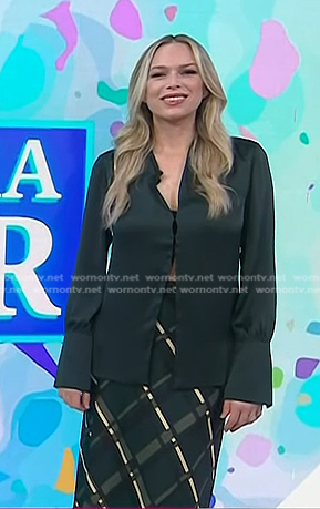 Erin Foster's green satin shirt and plaid skirt on Today