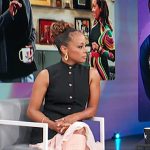 Essence Atkins’ black sleeveless layered dress on Access Hollywood