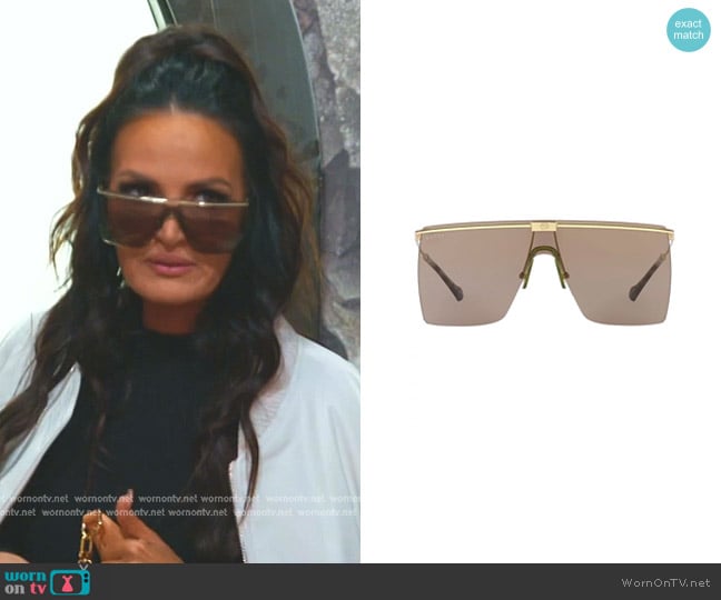 Gucci Shield Sunglasses in Gold Brown worn by Lisa Barlow on The Real Housewives of Salt Lake City