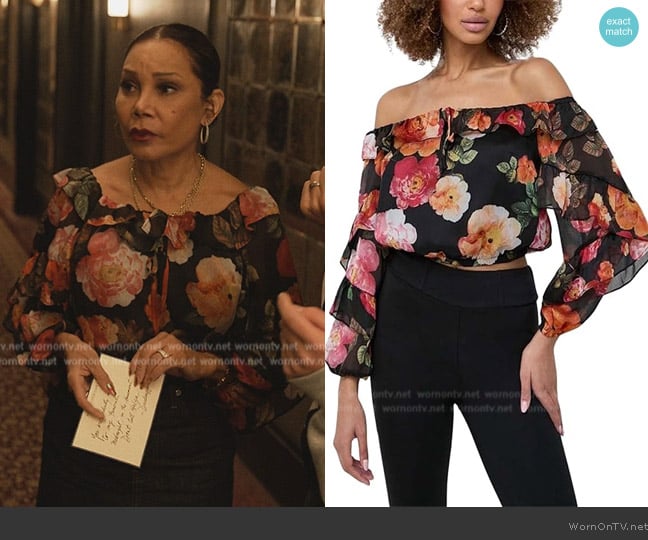 Inez’s black floral print off shoulder top on OMITB